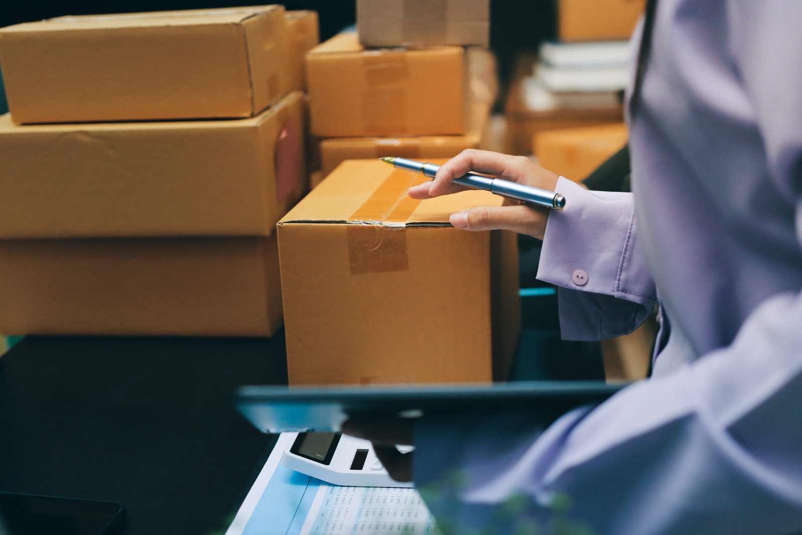 Portrait of Starting small businesses SME owners, two Asian woman check online orders Selling products working with boxs freelance work at home office, sme business online small medium enterprise